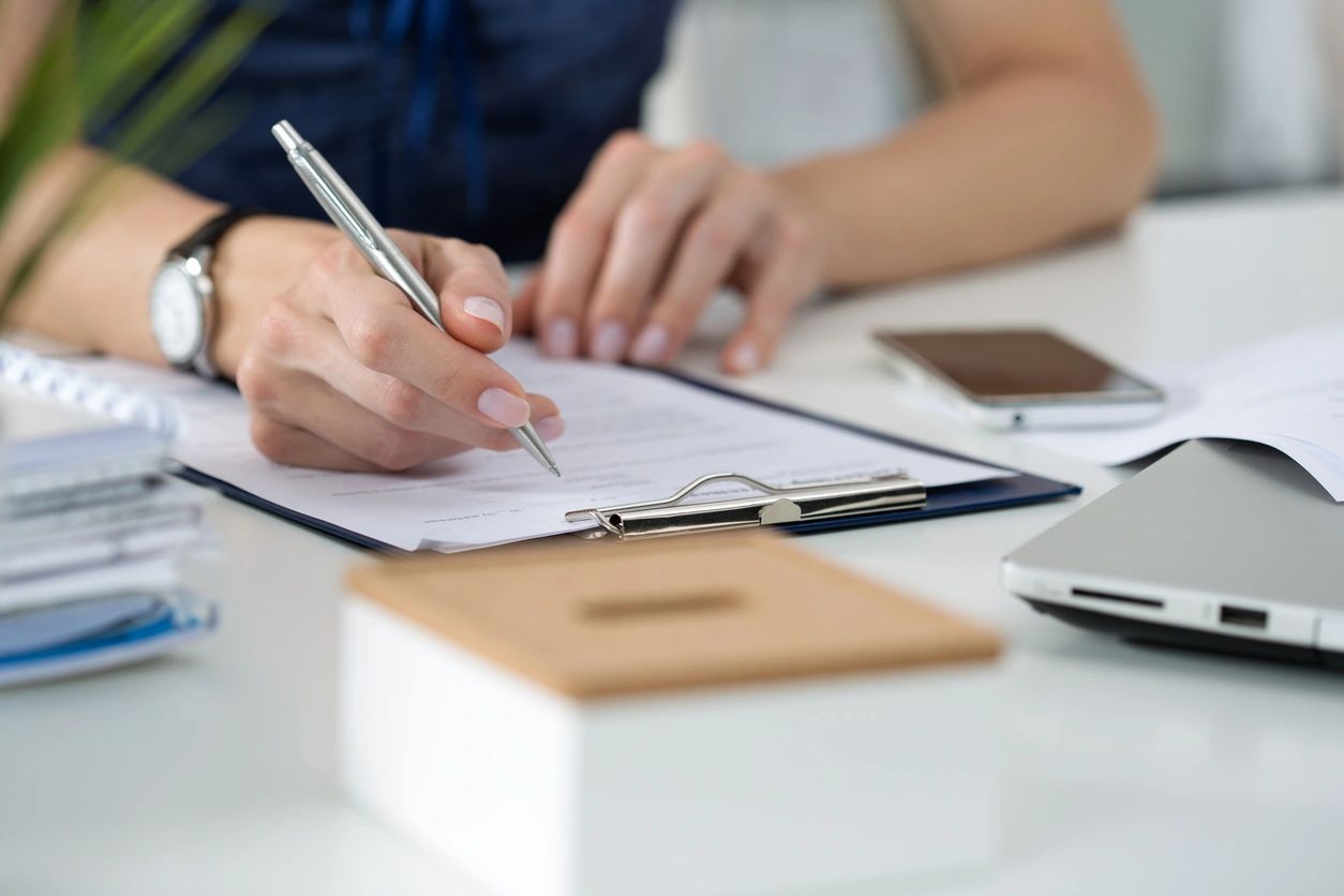 Professional writing on clipboard